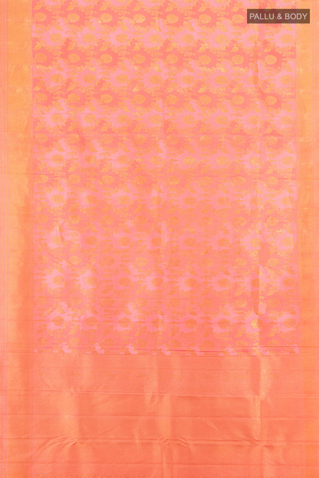 Flat view of Pure Silk Pure Zari Rose Gold Kanjivaram Saree with Zari Butta on the body and Silk Border. 