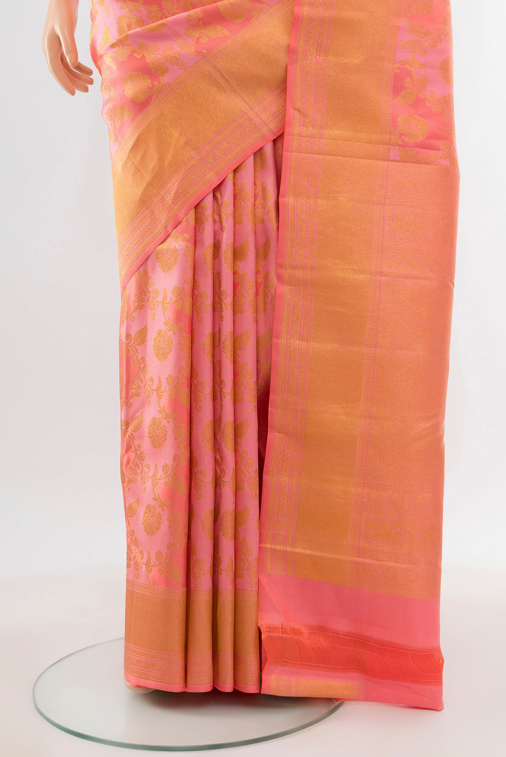 Pleats and pallu of Pure Silk Pure Zari Rose Gold Kanjivaram Saree with Zari Butta on the body and Silk Border. 
