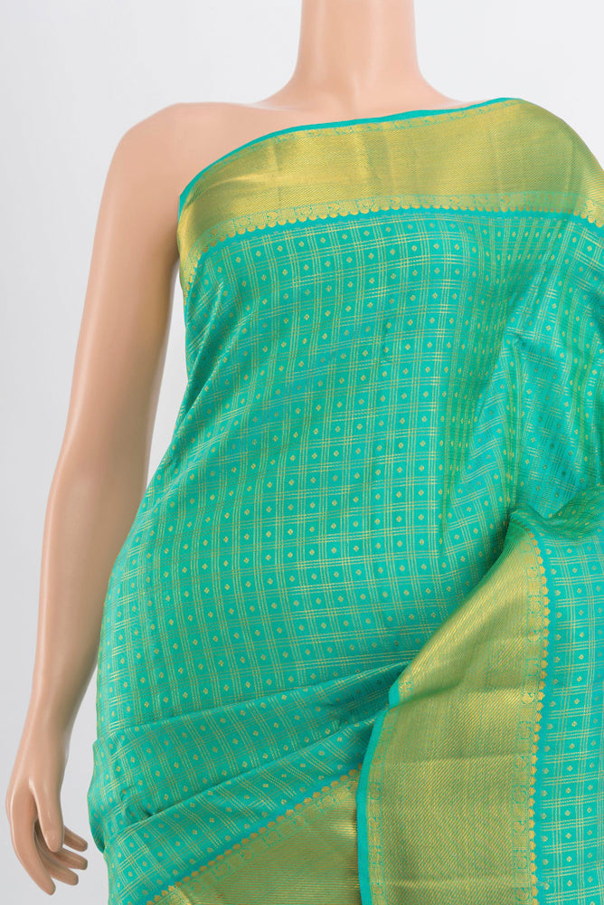Border image of Light Green Kanjivaram Silk Saree with Zari Butta on the body and Silk Border. 