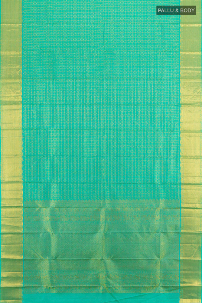 Flat view of Light Green Kanjivaram Silk Saree with Zari Butta on the body and Silk Border. 