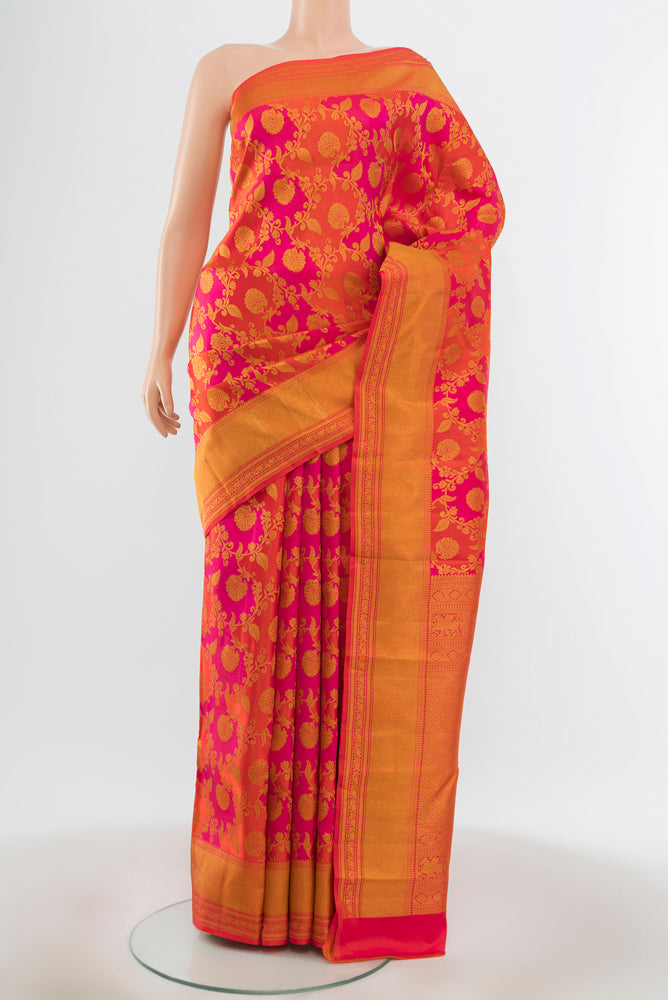 Multi Color Kanjivaram Silk Saree with Zari Butta on the body and Silk Border.  displayed on a mannequin