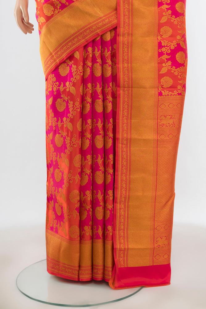 Pleats and pallu of Multi Color Kanjivaram Silk Saree with Zari Butta on the body and Silk Border. 