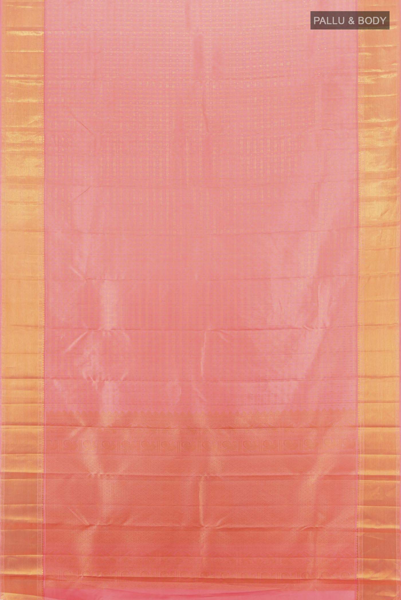 Flat view of Rose Gold Kanjivaram Silk Saree with Zari Butta on the body and Silk Border. 