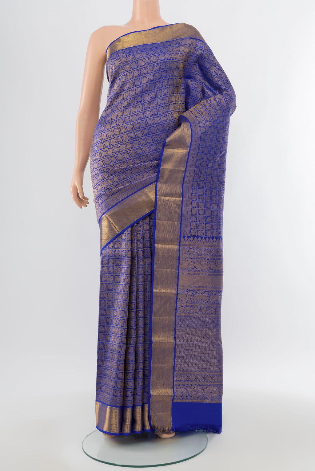 Pure Silk Pure Zari Dark Blue Kanjivaram Saree with Zari Butta on the body and Silk Border.  displayed on a mannequin