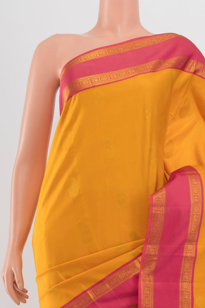 Border image of Yellow Kanchipuram Silk Saree with Zari Butta on the body and Silk Border. 