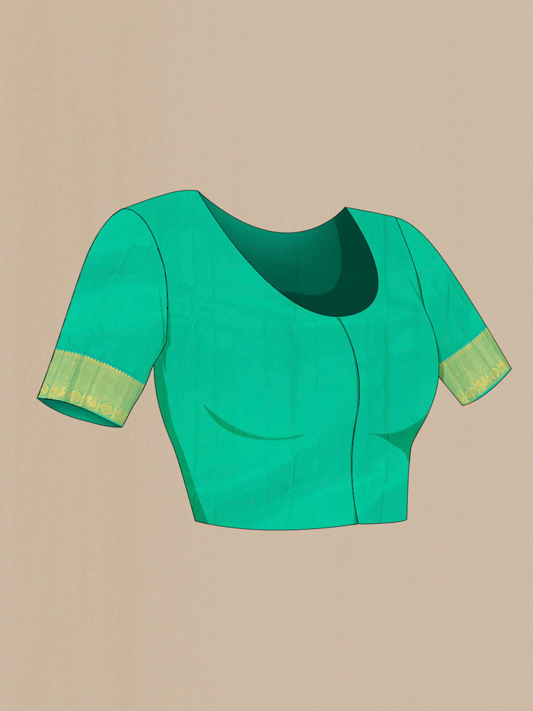 Close up image of the blouse of Rani Pink Kanchipuram Silk Saree with Zari Butta on the body and Silk Border. 
