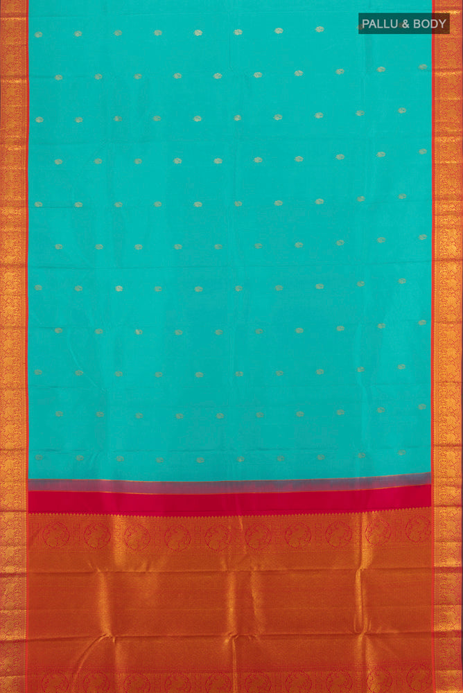 Flat view of Light Blue Kanchipuram Silk Saree with Zari Butta on the body and Silk Border. 