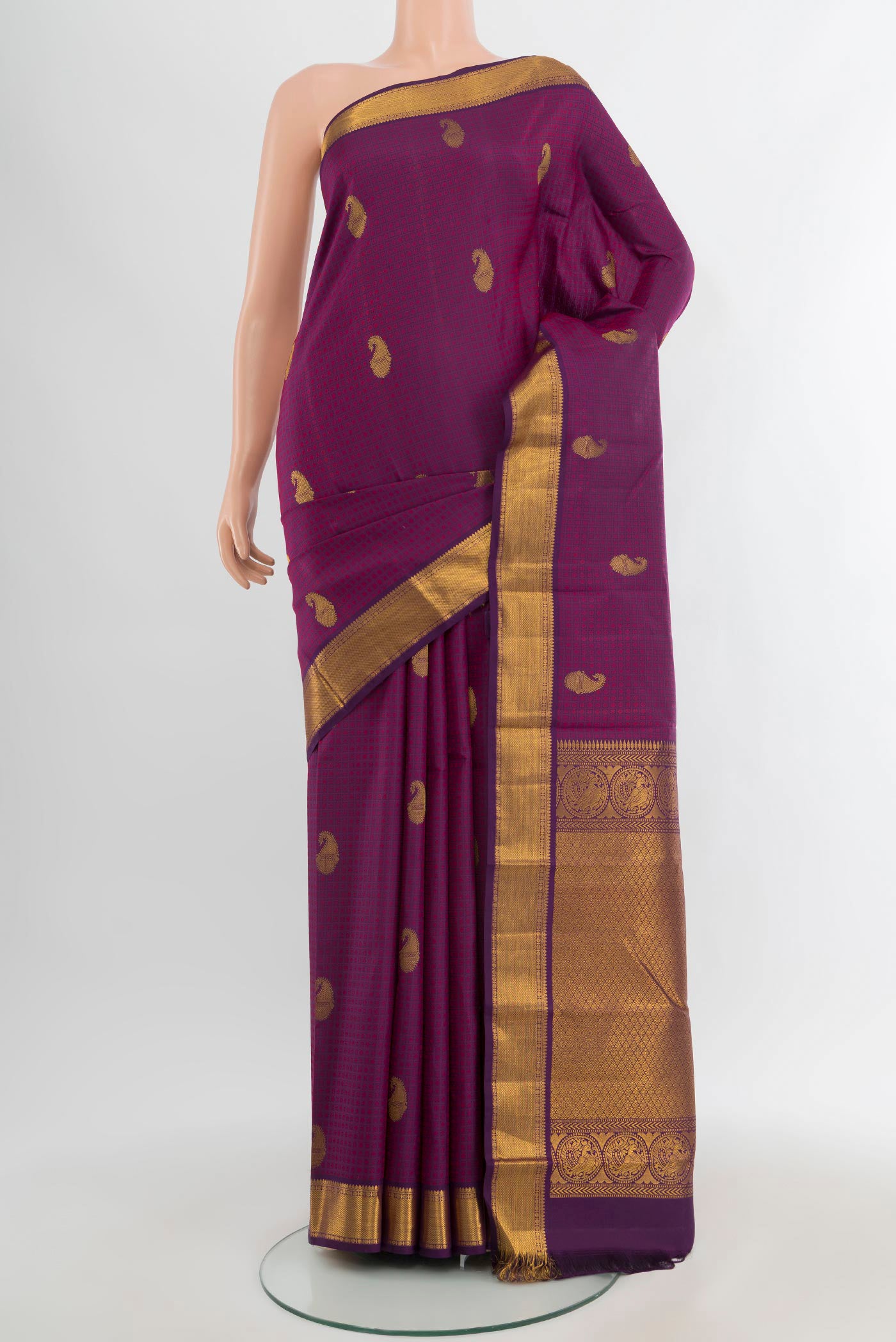 Purple Kanchipuram Silk Saree with Jacquard With Zari Butta on the body and Zari Border.  displayed on a mannequin