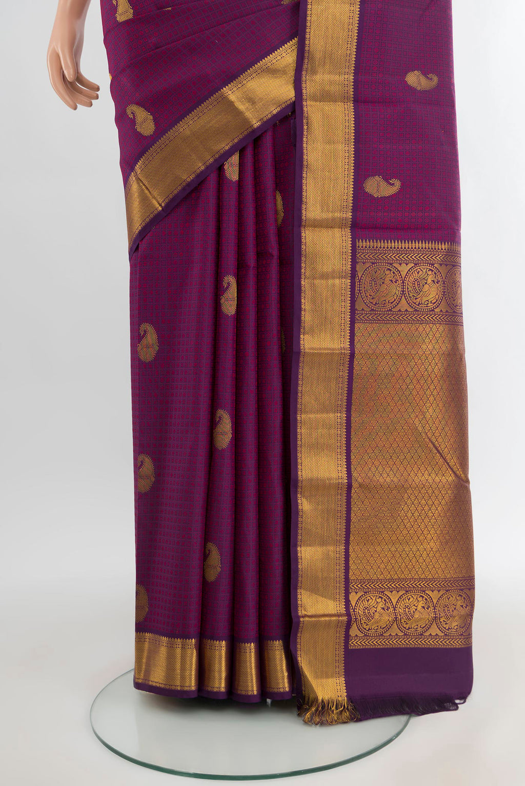 Pleats and pallu of Purple Kanchipuram Silk Saree with Jacquard With Zari Butta on the body and Zari Border. 