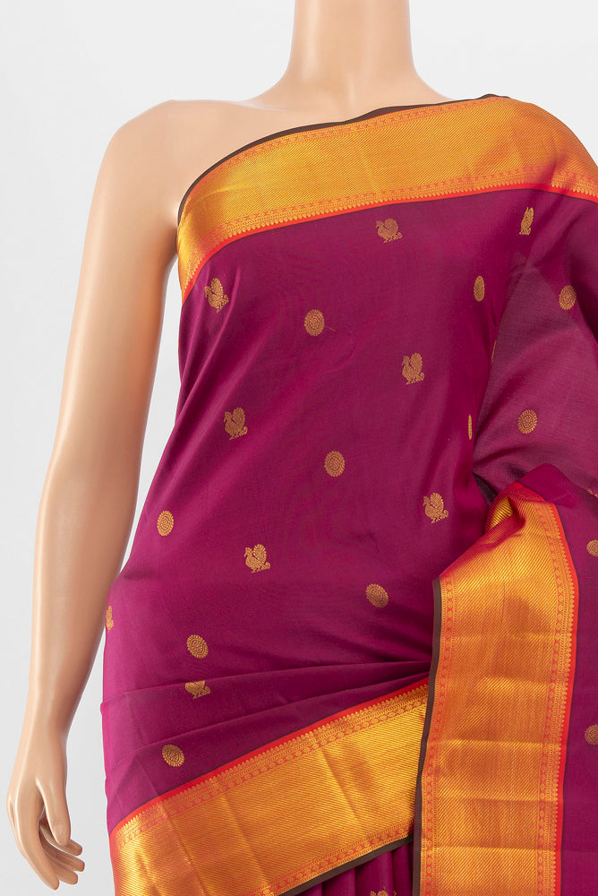 Border image of Magenta Kanchipuram Silk Saree with Zari Butta on the body and Silk Border. 