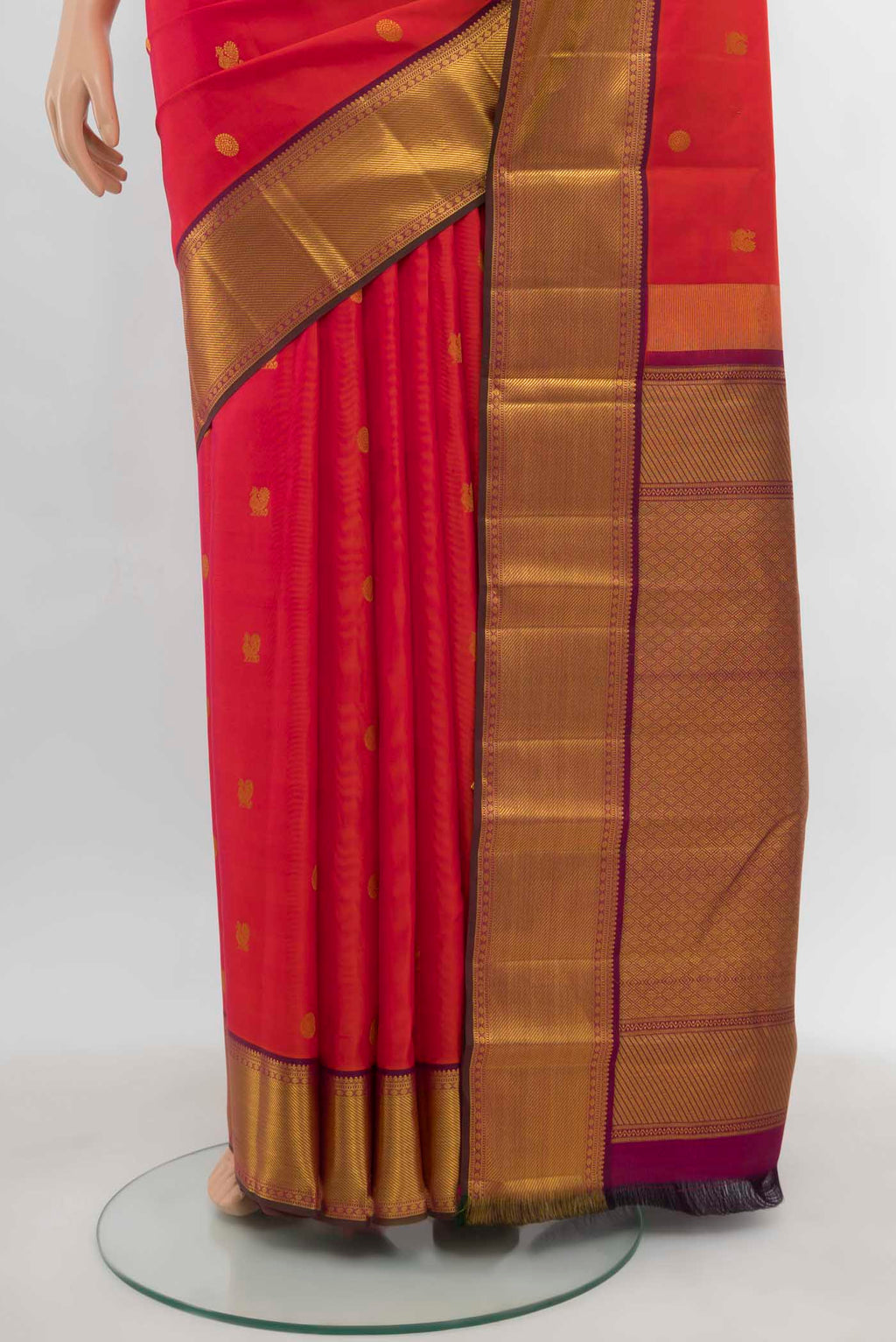 Pleats and pallu of Imperial Pink Kanchipuram Silk Saree with Zari Butta on the body and Silk Border. 