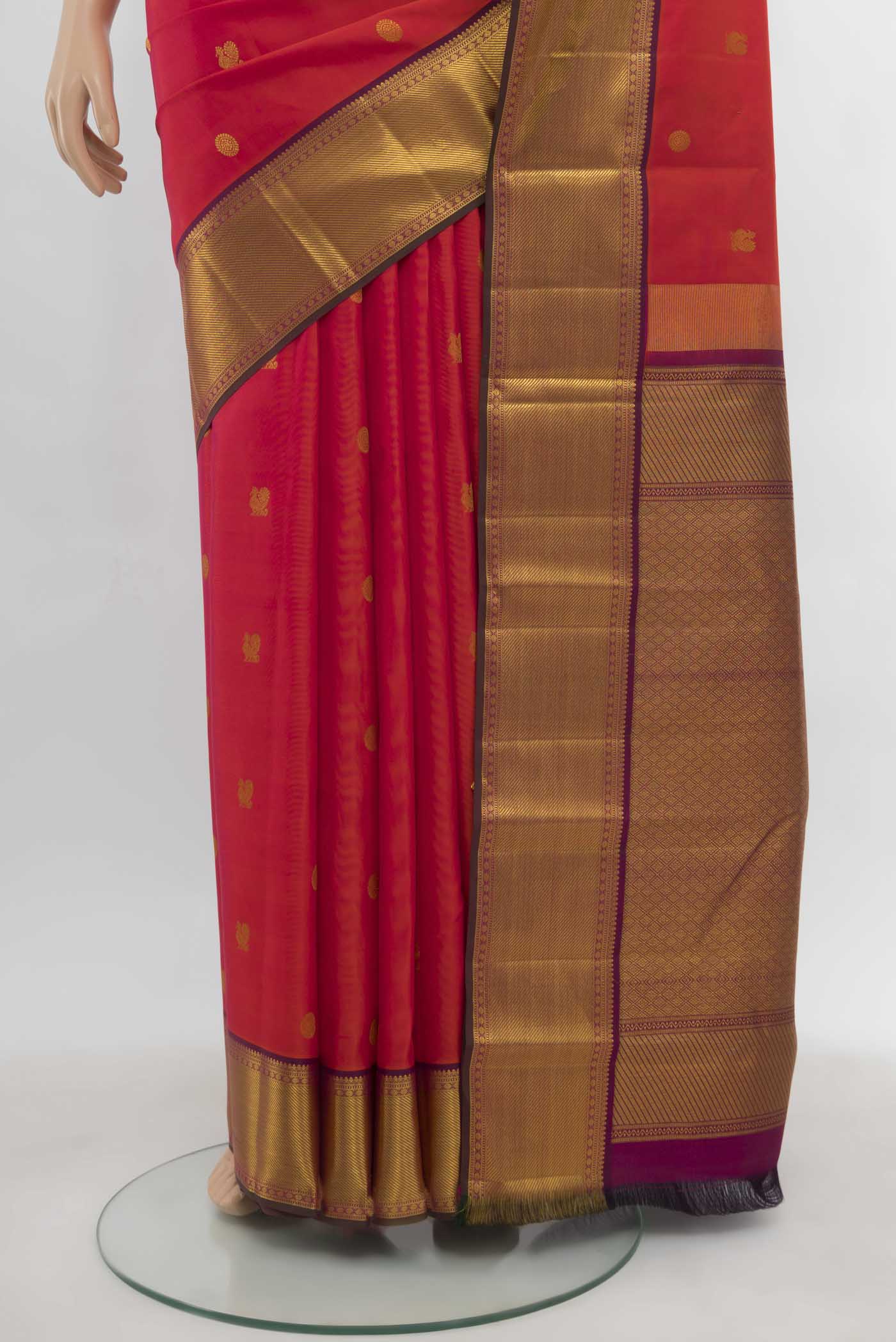 Pleats and pallu of Imperial Pink Kanchipuram Silk Saree with Zari Butta on the body and Silk Border. 