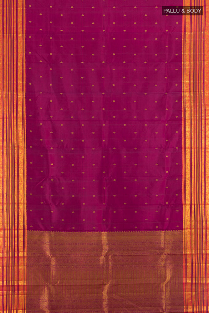 Flat view of Purple Kanchipuram Silk Saree with Zari Butta on the body and Silk Border. 