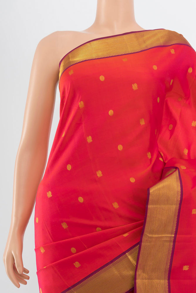 Border image of Pure Silk Pure Zari Peach Kanjivaram Saree with Zari Butta on the body and Silk Border. 