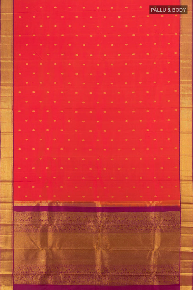 Flat view of Pure Silk Pure Zari Peach Kanjivaram Saree with Zari Butta on the body and Silk Border. 