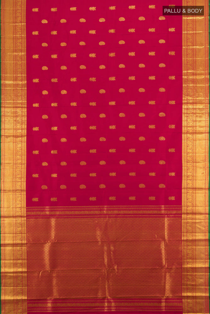 Flat view of Dark Pink Kanjivaram Silk Saree with Zari Butta on the body and Silk Border. 