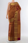 Maroon Kanchipuram Silk Saree with Zari Butta on the body and Silk Border.  displayed on a mannequin