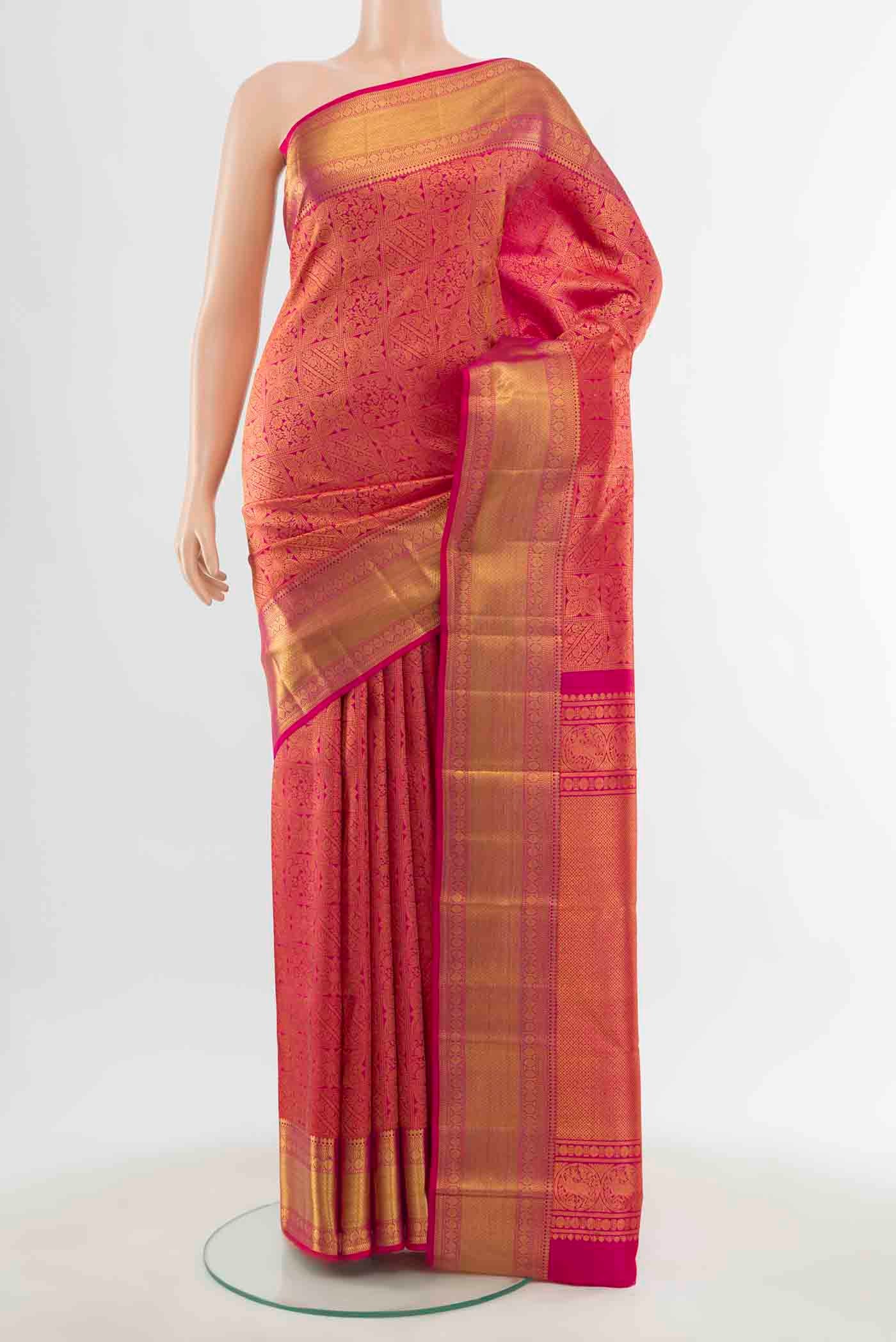 Rani Pink Kanchipuram Silk Saree with Zari Butta on the body and Silk Border displayed on a mannequin