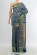 Peacock Blue Kanchipuram Silk Saree with Zari Brocade on the body and Zari Border.  displayed on a mannequin