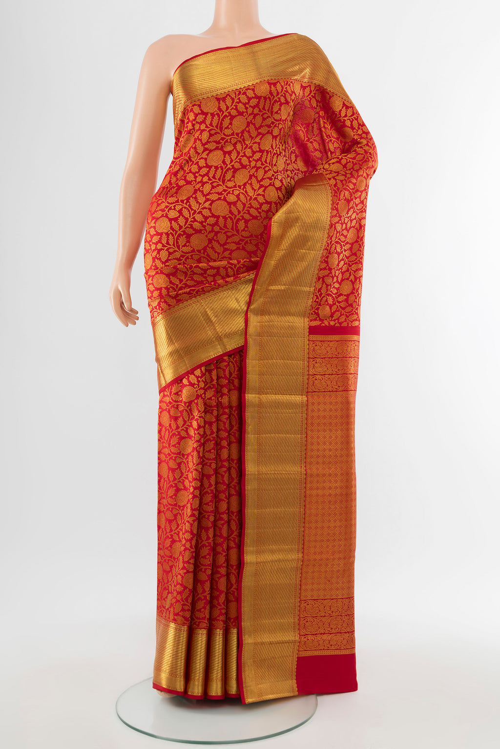 Pure Silk Pure Zari Red Kanchipuram Saree with Zari Butta on the body and Silk Border.  displayed on a mannequin