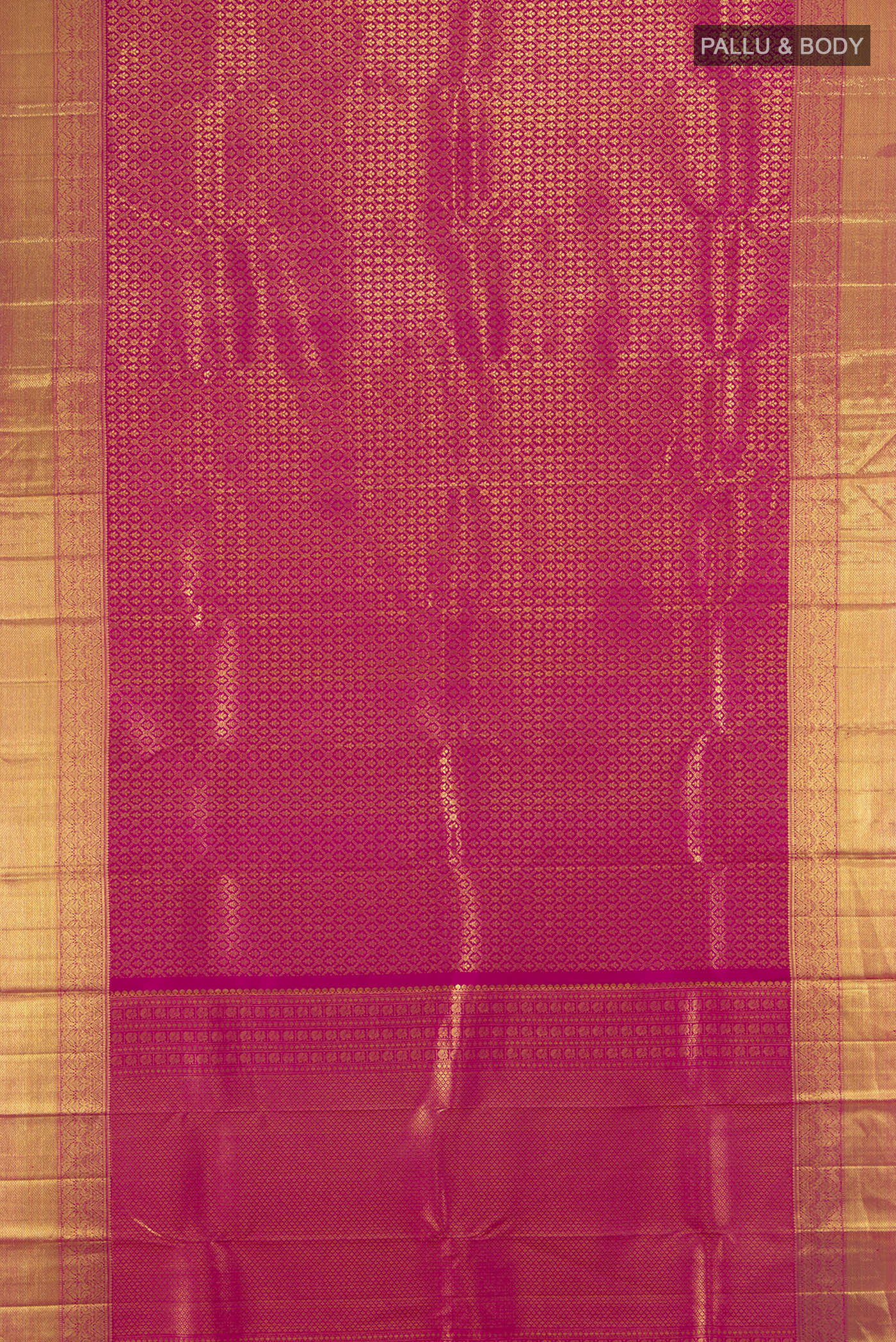 Flat view of Pure Silk Pure Zari Magenta Kanchipuram Saree with Zari Butta on the body and Silk Border. 