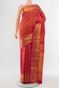 Golden Kanchipuram Silk Saree with Zari Butta on the body and Silk Border.  displayed on a mannequin