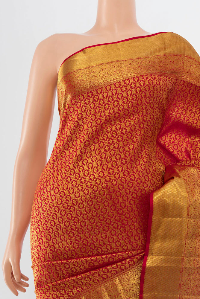 Border image of Golden Kanchipuram Silk Saree with Zari Butta on the body and Silk Border. 