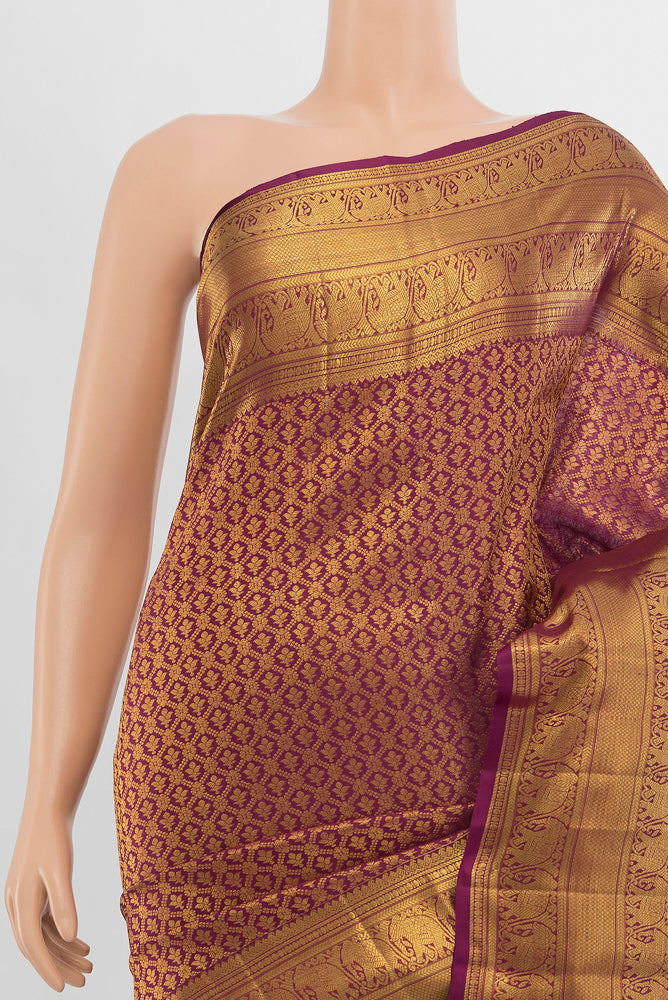 Border image of Pure Silk Pure Zari Light Magenta Kanchipuram Saree with Zari Butta on the body and Silk Border. 