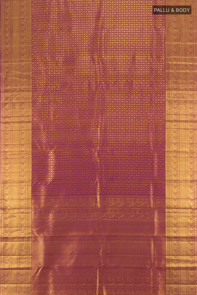Flat view of Pure Silk Pure Zari Light Magenta Kanchipuram Saree with Zari Butta on the body and Silk Border. 