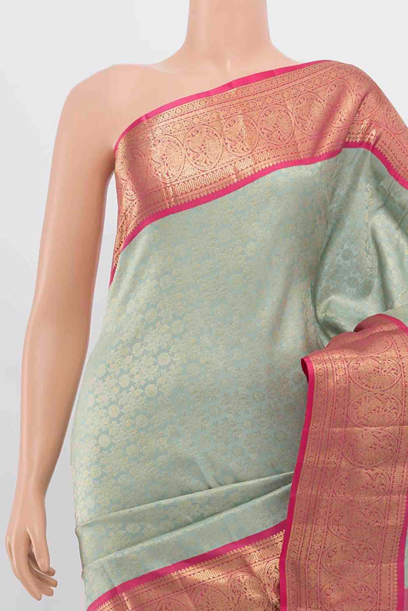 Border image of Sky Blue Kanchipuram Silk Saree with Zari Butta on the body and Silk Border. 