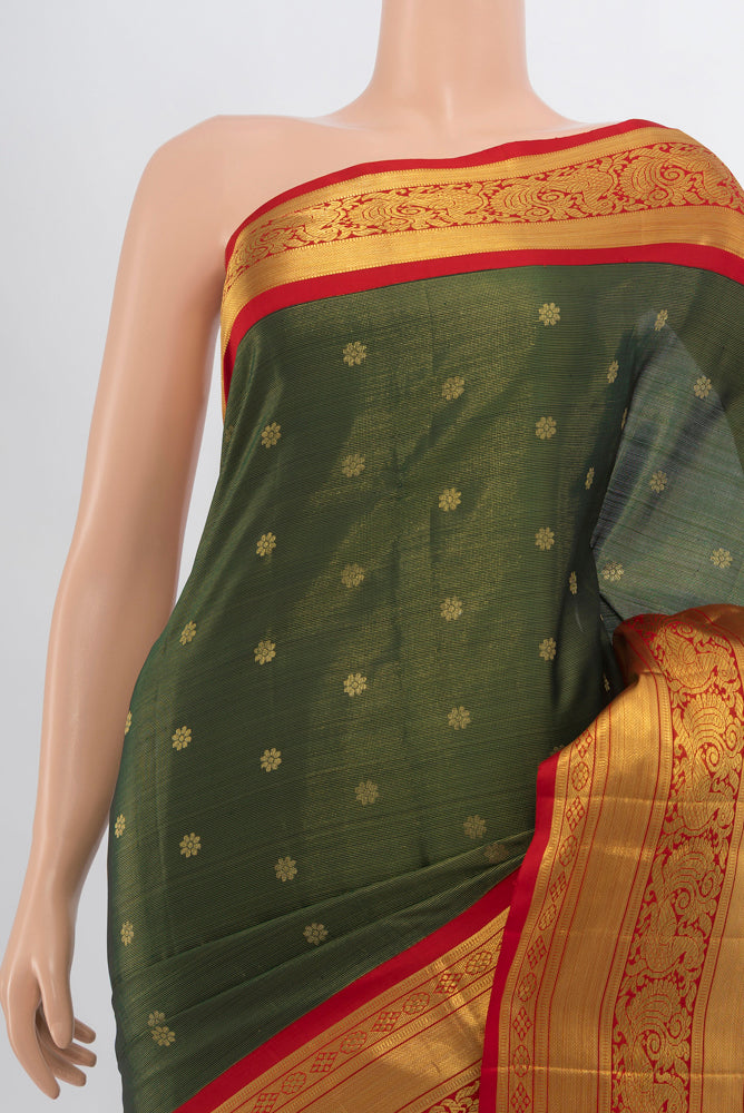 Border image of Bottle Green Kanjivaram Silk Saree with Zari Butta on the body and Silk Border. 