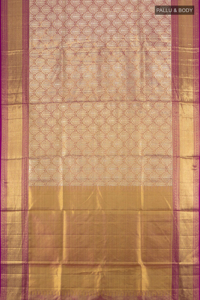 Flat view of Golden Kanjivaram Silk Saree with Zari Butta on the body and Silk Border. 