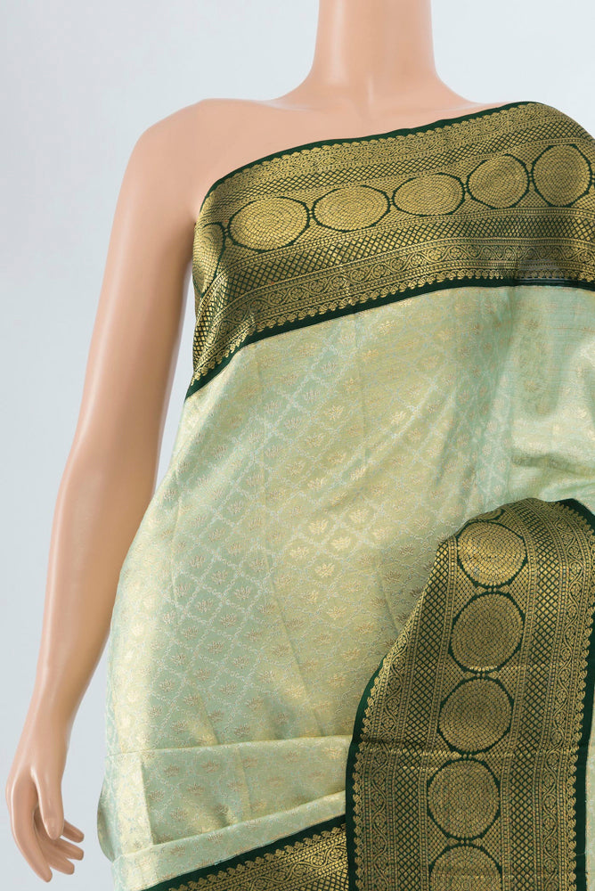 Border image of Pista Green Kanjivaram Silk Saree with Zari Butta on the body and Silk Border. 