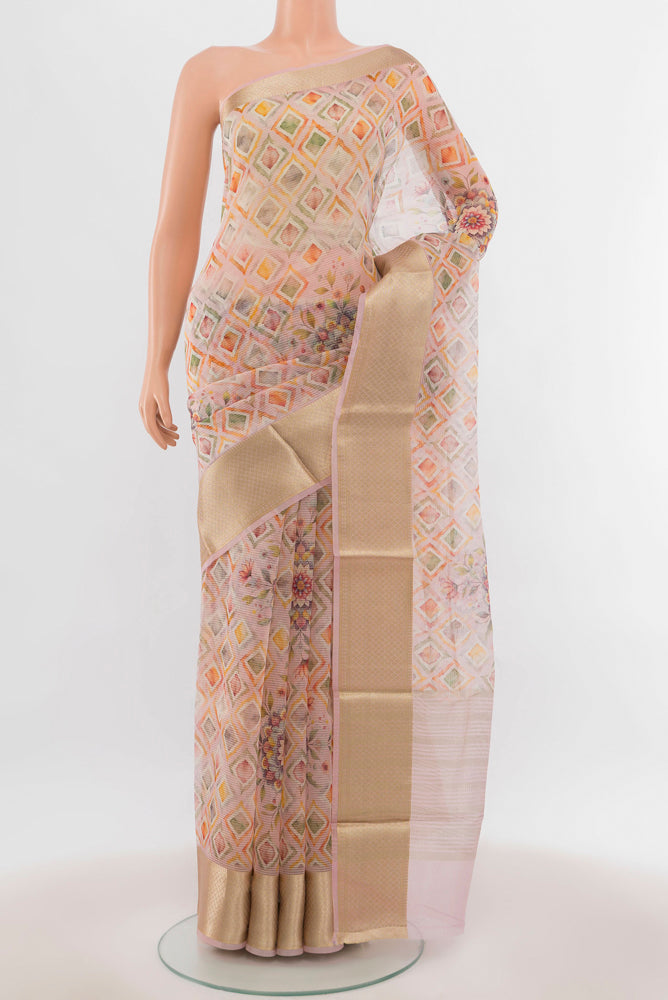 Multi Color Tussar Silk Saree with Floral Print on the body and Silk Border.  displayed on a mannequin