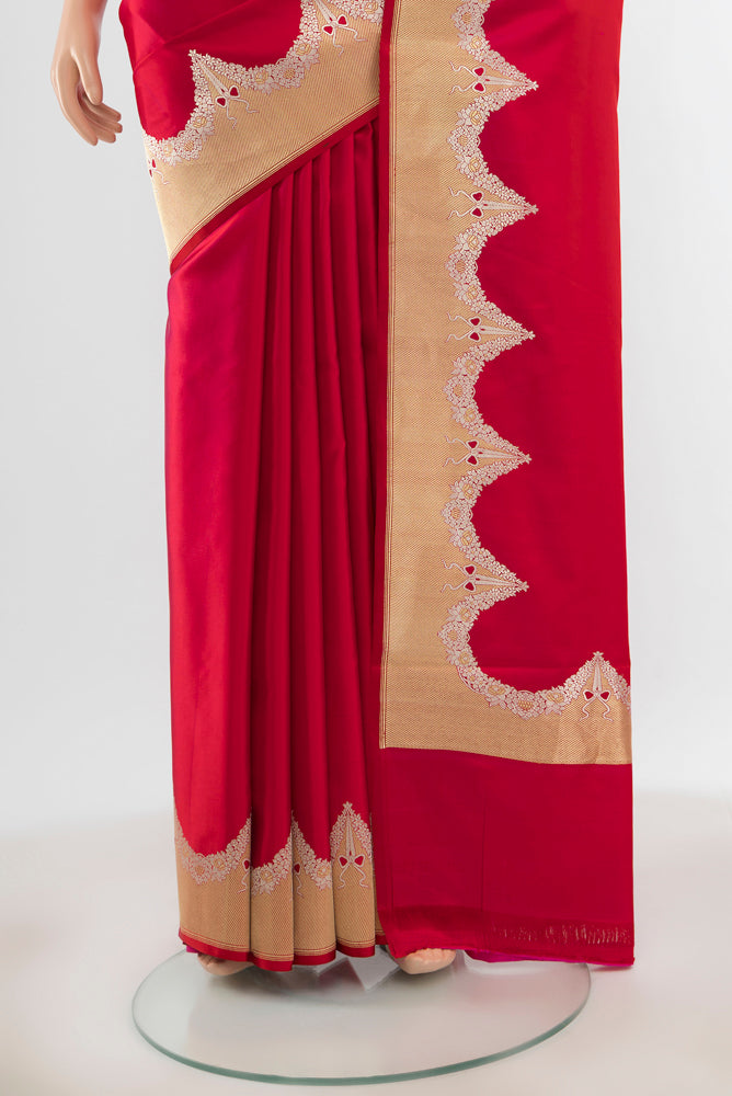 Pleats and pallu of Dark Pink Banarasi Katan Silk Saree with Zari Butta on the body and Silk Border. 