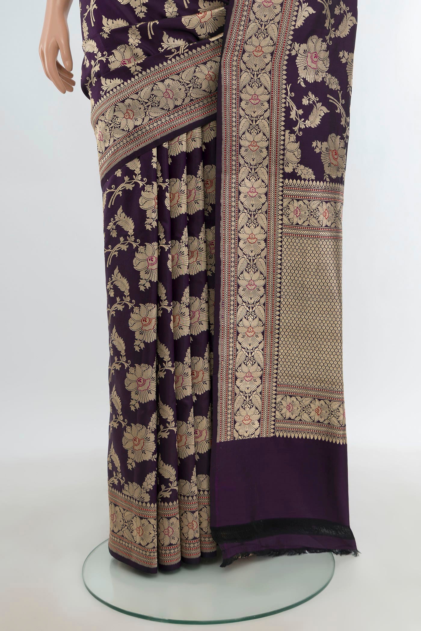 Pleats and pallu of Pure Silk Pure Zari Navy Blue Banarasi Saree with Zari Butta on the body and Zari Border. 