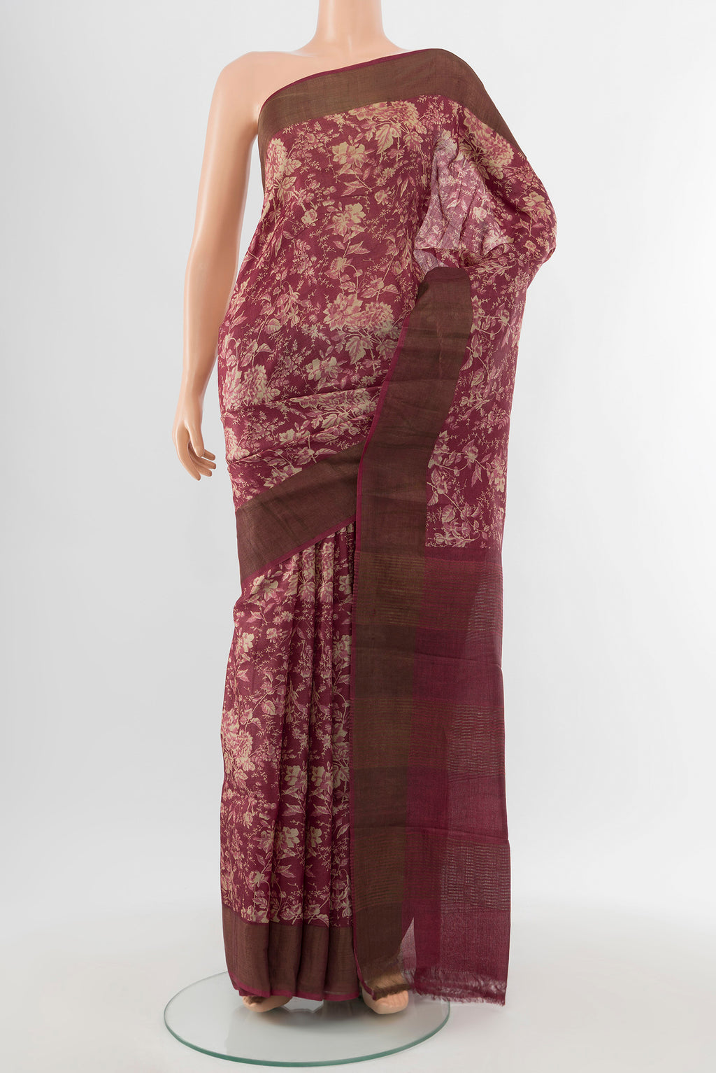 Multi Color Tussar Silk Saree with Floral Print on the body and Silk Border.  displayed on a mannequin