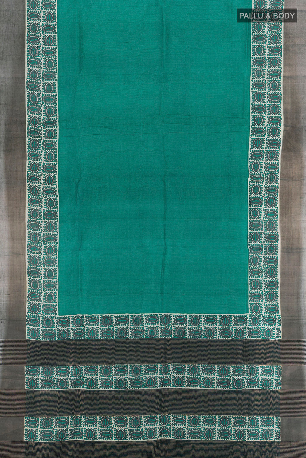 Flat view of Peacock Blue Tussar Silk Saree with Floral Print on the body and Silk Border. 