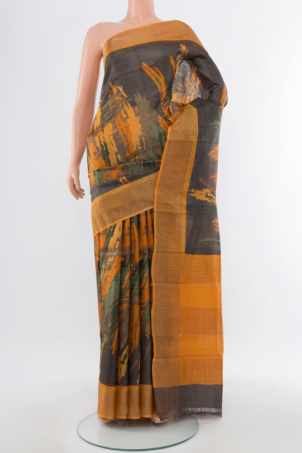 Multi Color Tussar Silk Saree with Floral Print on the body and Silk Border.  displayed on a mannequin