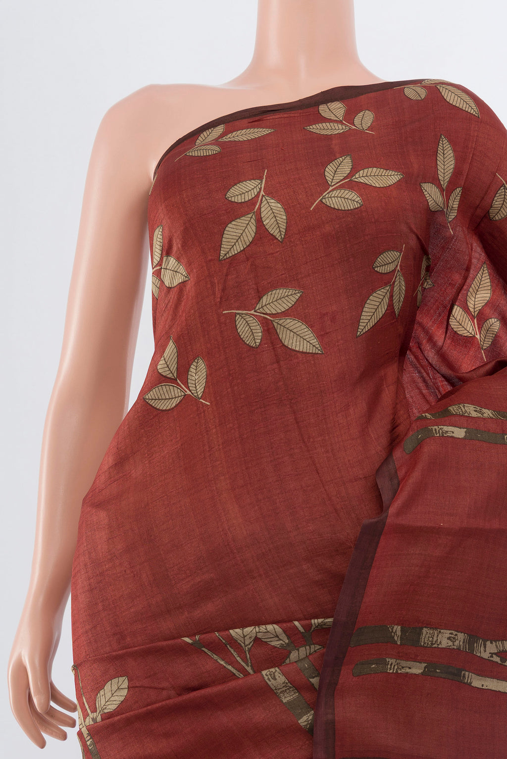 Border image of Brown Tussar Silk Saree with Floral Print on the body and Silk Border. 