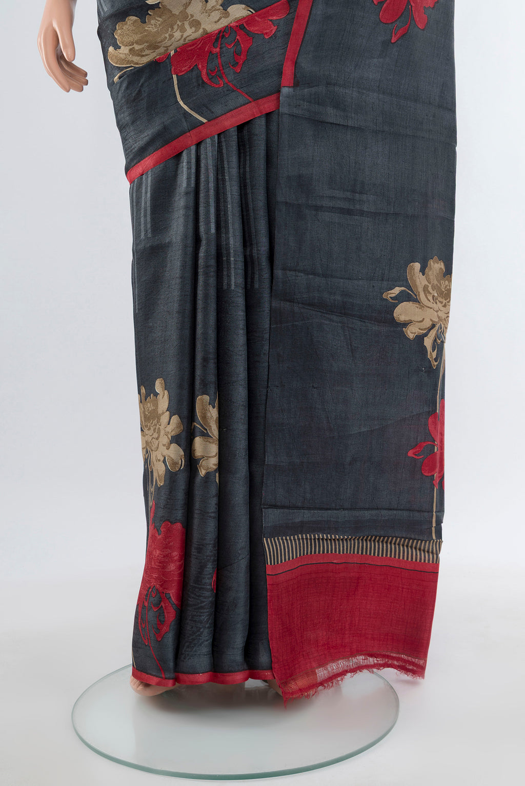 Pleats and pallu of Multi Color Tussar Silk Saree with Floral Print on the body and Silk Border. 