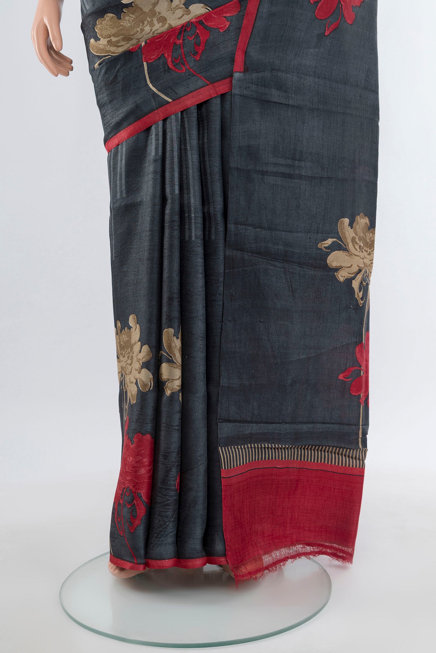 Pleats and pallu of Multi Color Tussar Silk Saree with Floral Print on the body and Silk Border. 