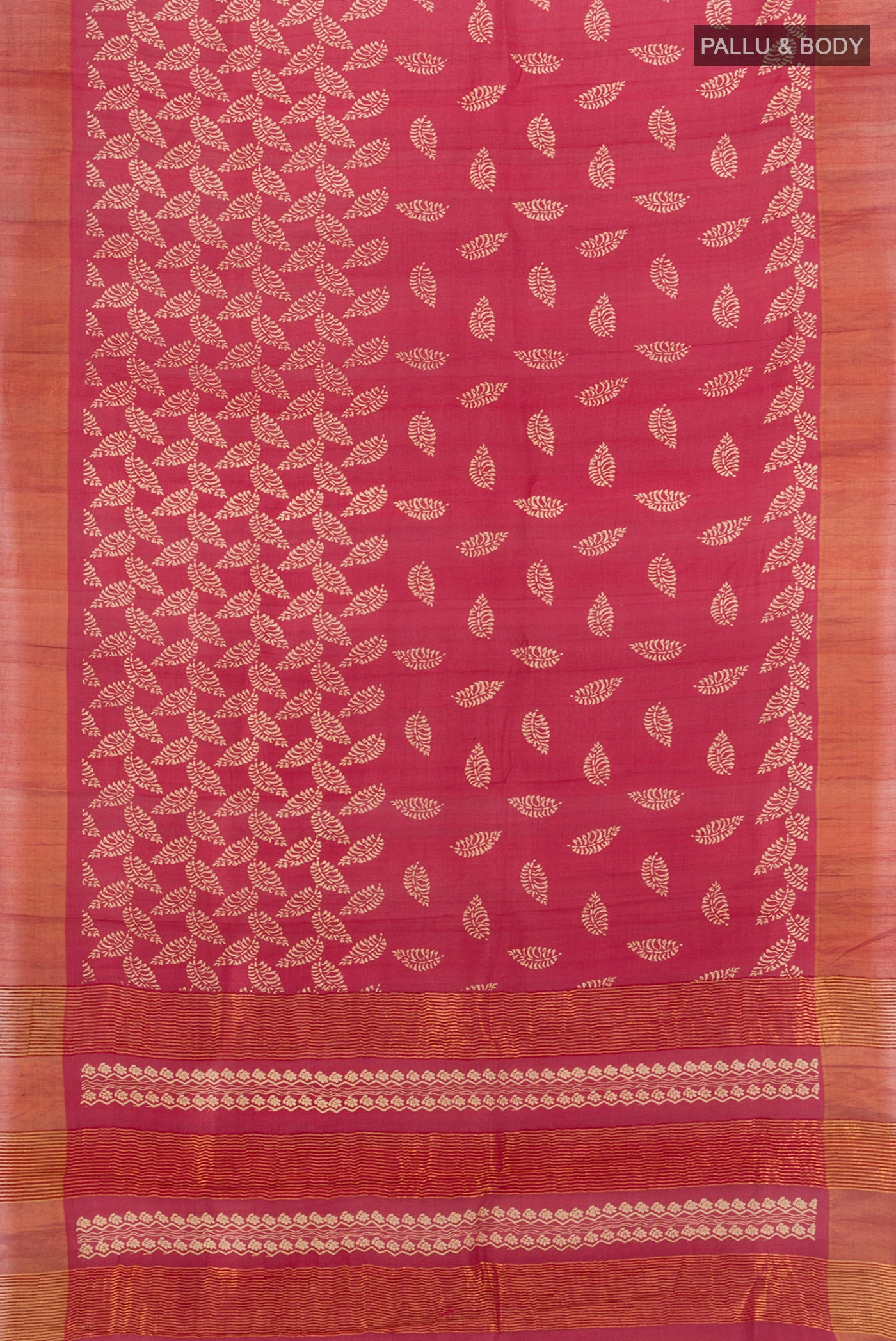 Flat view of Peach Tussar Silk Saree with Floral Print on the body and Silk Border. 