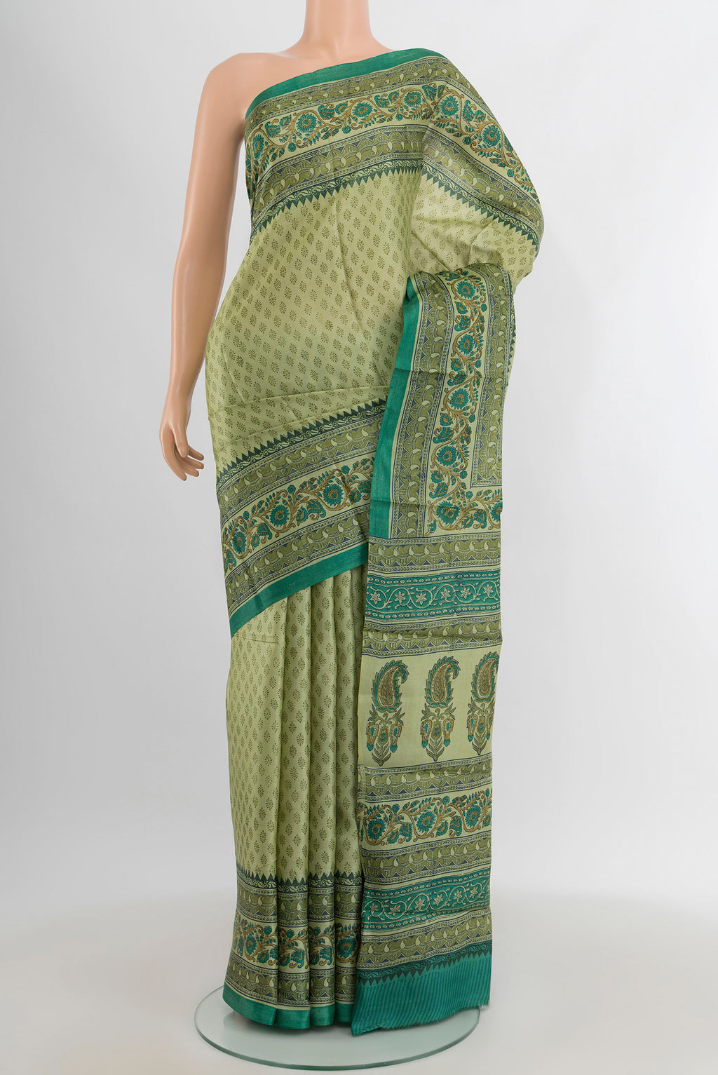 Beige Tussar Silk Saree with Printed design on the body and Printed Border.  displayed on a mannequin