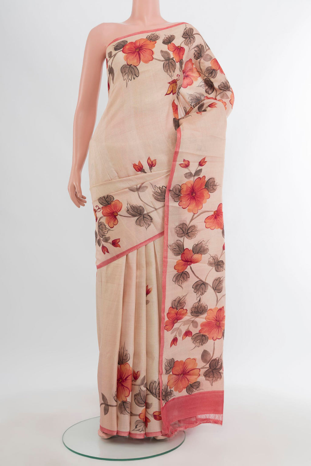 Sandal Tussar Silk Saree with Floral Print on the body and Printed Border.  displayed on a mannequin