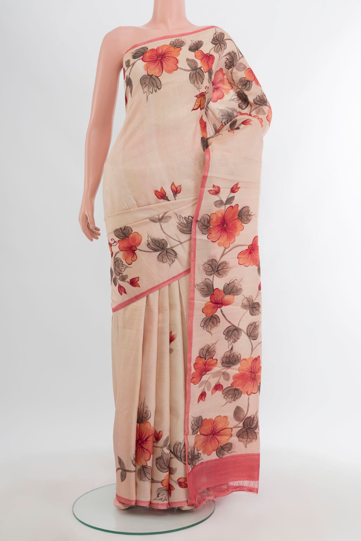 Sandal Tussar Silk Saree with Floral Print on the body and Printed Border.  displayed on a mannequin