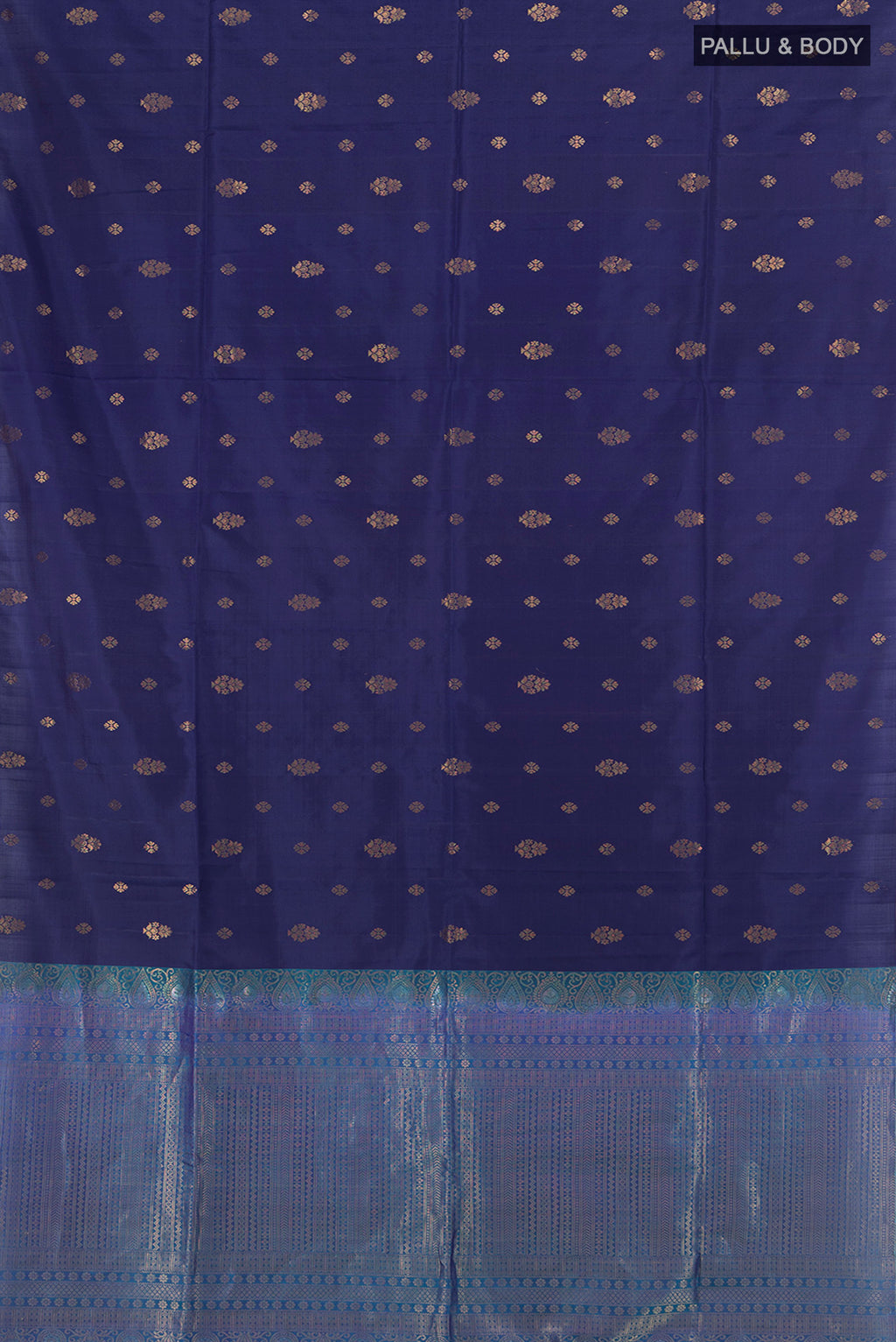 Flat view of Navy Blue Soft Silk Saree with Zari Butta on the body and Zari Border. 
