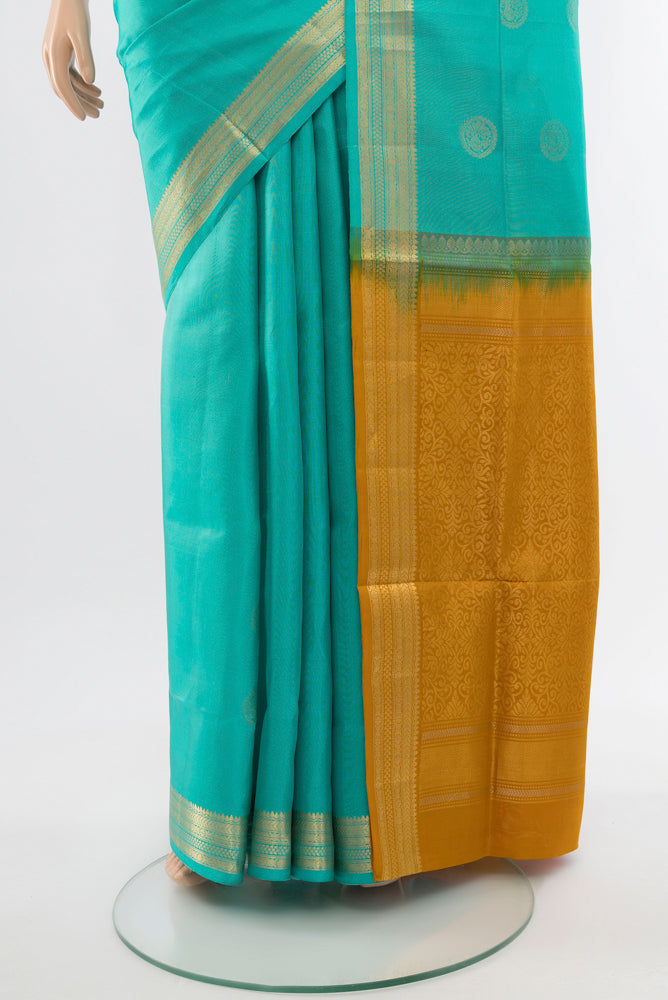 Pleats and pallu of Sky Blue Soft Silk Saree with Zari Butta on the body and Silk Border. 