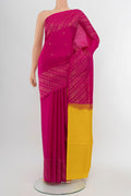 Magenta Soft Silk Saree with Zari Butta on the body and Silk Border.  displayed on a mannequin