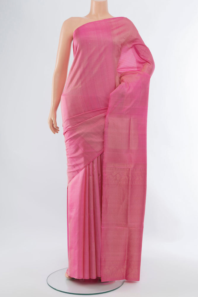 Rose pink Soft Silk Saree with Zari Butta on the body and Silk Border.  displayed on a mannequin